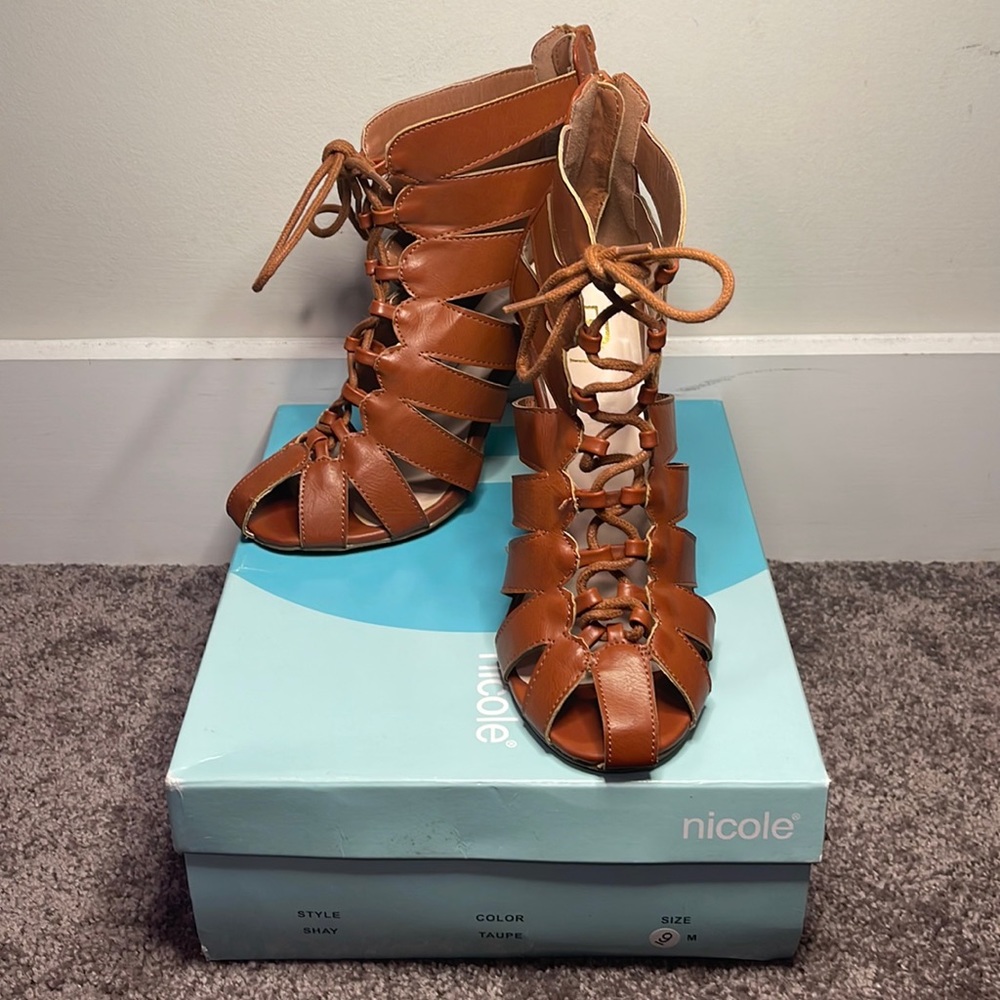 Brown lace up heels.